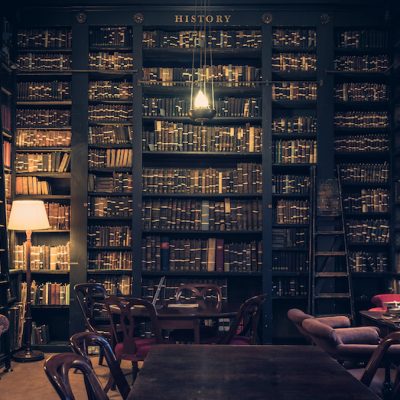 A dark bookshelf in a library