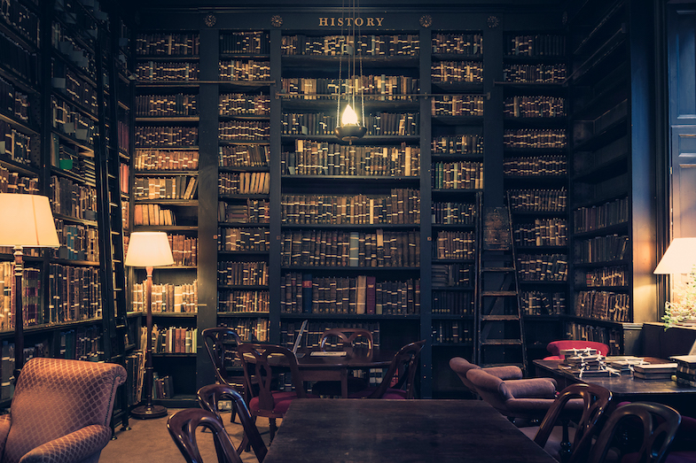 A dark bookshelf in a library