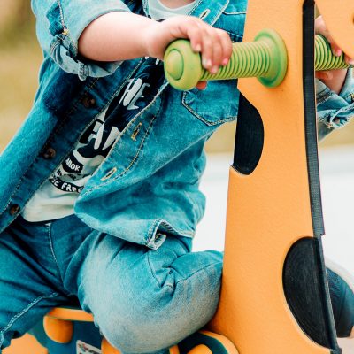Closeup of a child, playing at a playground
