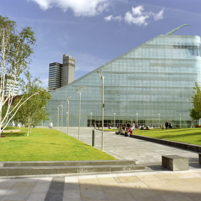 The National Football Museum and Cathedral Gardens on a sunny day.