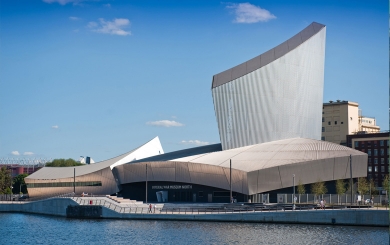 The outside of the Imperial War Museum North on a sunny day.