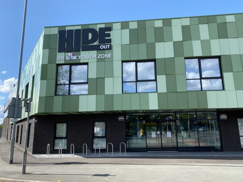The outside of the HideOut Youth Zone building on a sunny day.