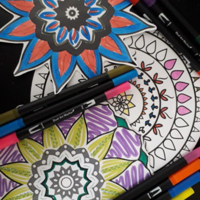 A brightly coloured Diwali colouring in sheet and some flet tip pens.