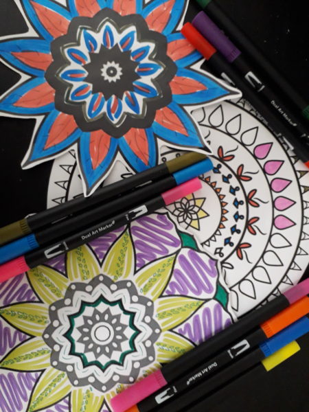 A brightly coloured Diwali colouring in sheet and some flet tip pens.