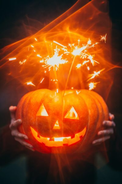 A Halloween pumpkin lit up with soarklers.