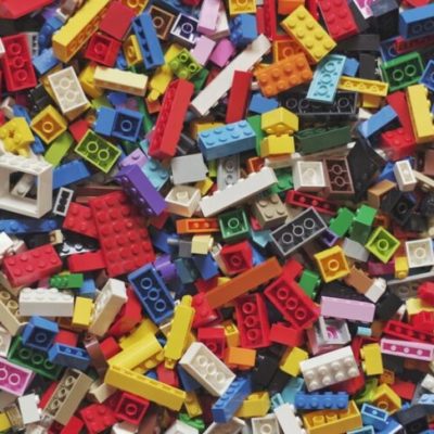 Hundreds of different coloured LEGO bricks.